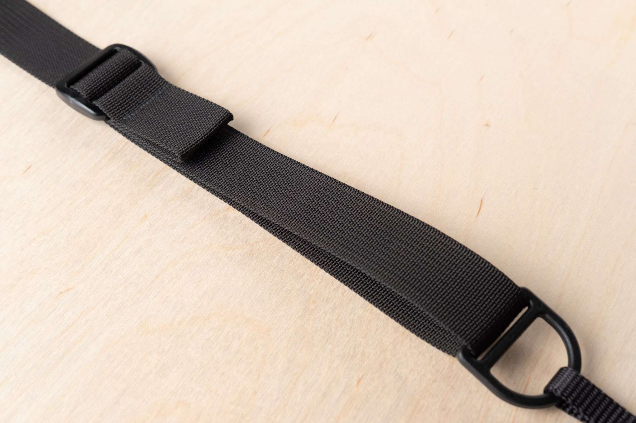 F1’s Adjustment Tab quickly tailors strap length without over-engineered hardware.